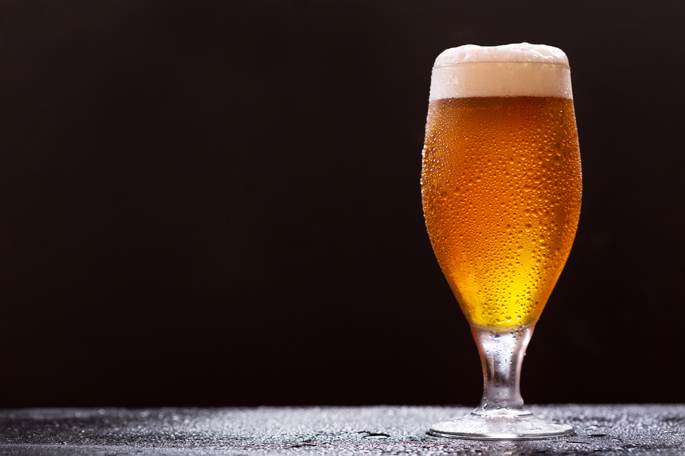 Glass,Of,Beer,On,Dark,Background