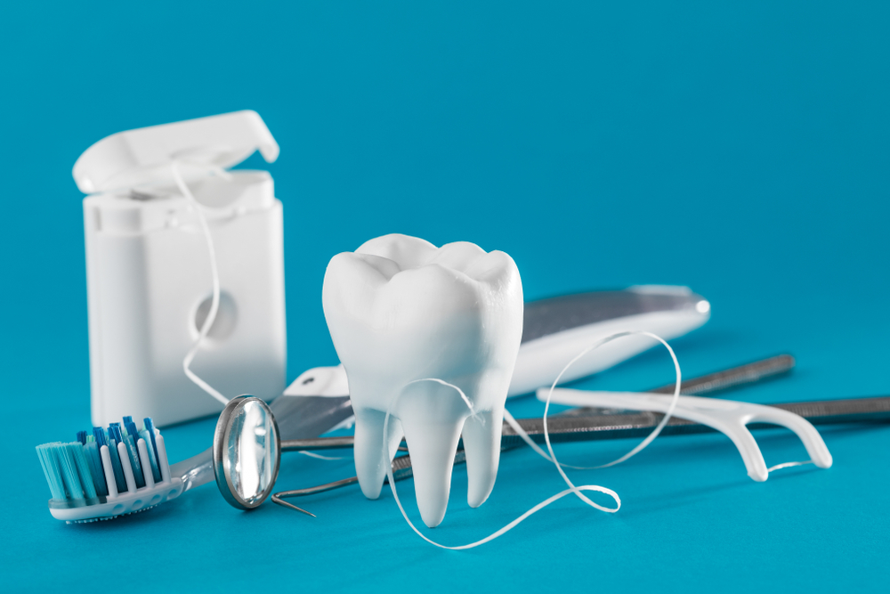 White,Healthy,Tooth,,Different,Tools,For,Dental,Care.,Dental,Background.