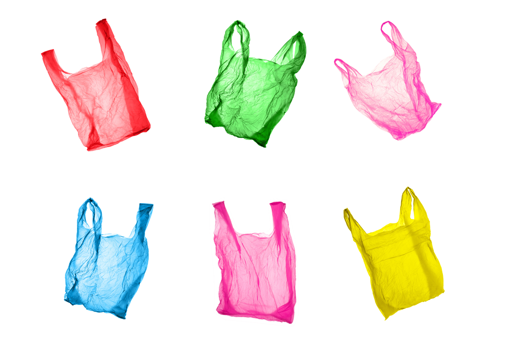 Plastic,Bags,Of,Different,Colors,On,A,White,Background.,Isolated