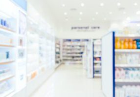 Abstract blur and defocused pharmacy and drug store interior for background