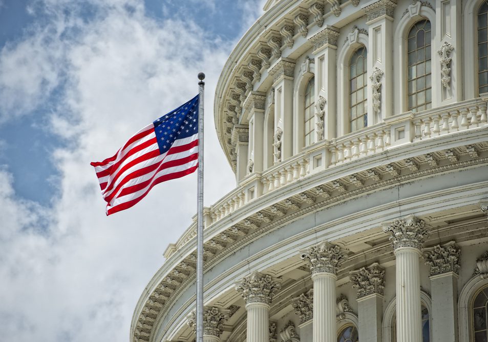 Washington,Dc,Capitol,Dome,Detail,With,Waving,American,Flag